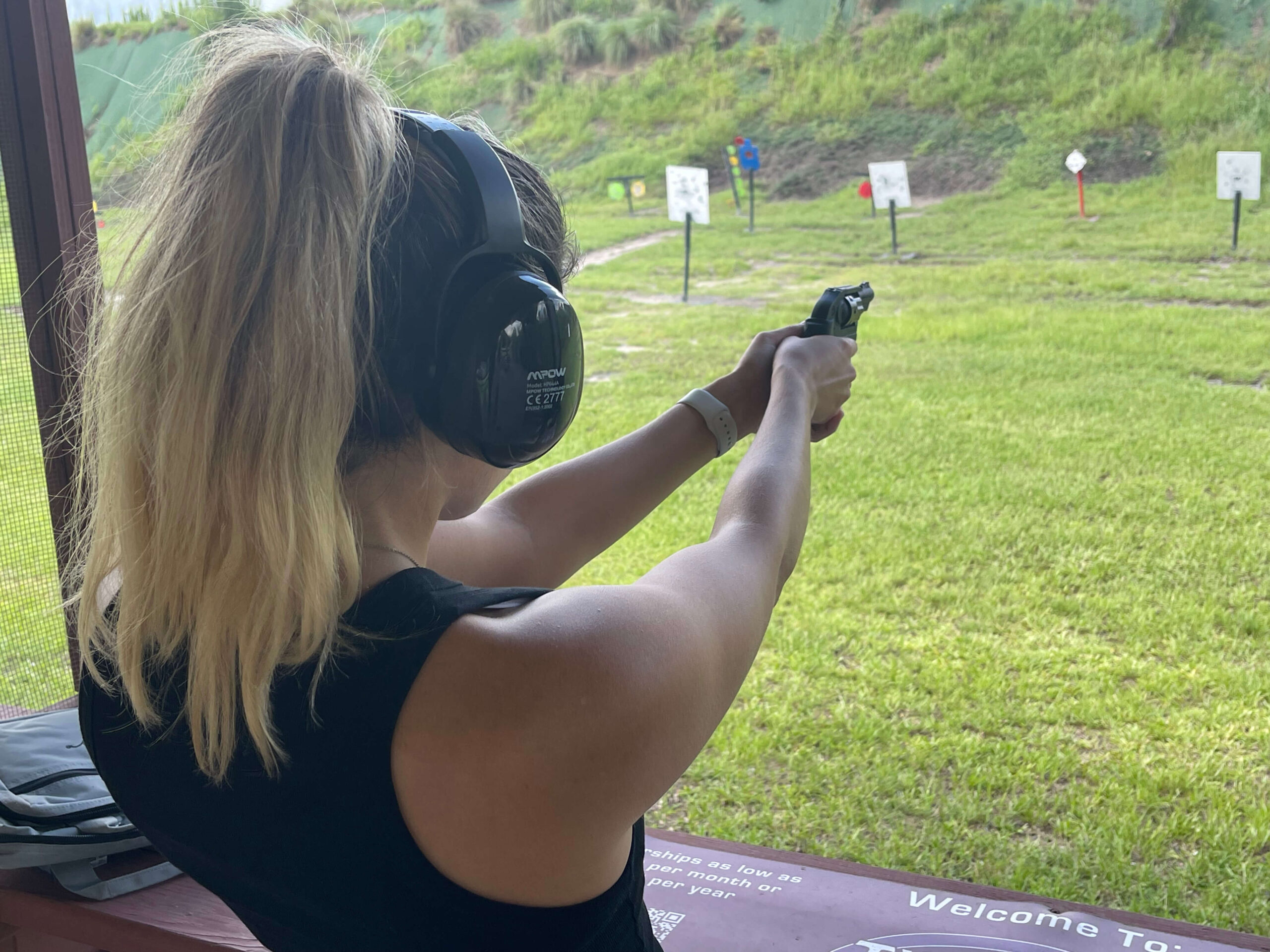 A girl practices shooting